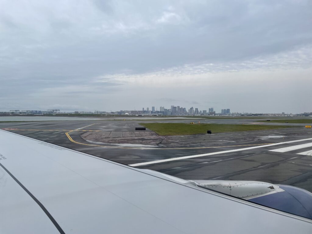 A view of Boston from an airplane taxiing at Boston Logan Airport
